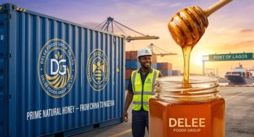 A vibrant blog cover image illustrating Premium Natural Honey from Delee Foods Group being unloaded from a 20ft shipping container at a busy Nigerian port like Lagos at sunrise, symbolizing the new partnership and West African expansion.