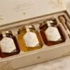 Premium honey gift box design — three-jar set with botanical labels and molded insert